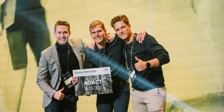 Picture showing Adact team with prize