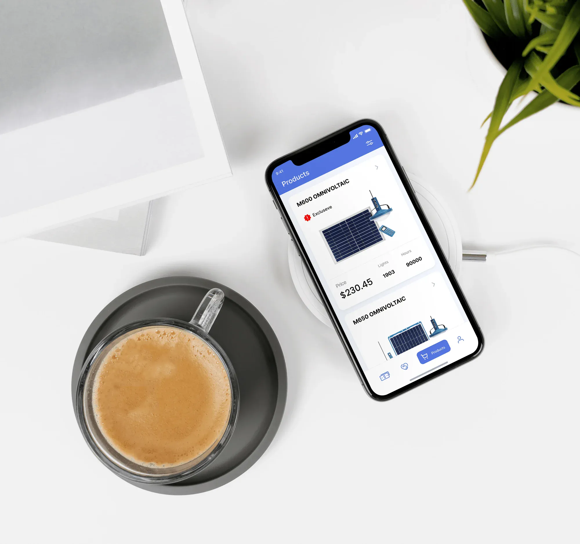 iPhone on wireless charger next to a cappuccino present app screen interface