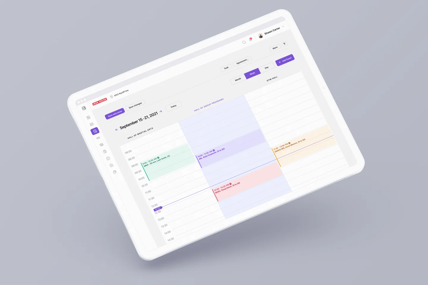 Tablet view of gym scheduling calendar with group programs and events