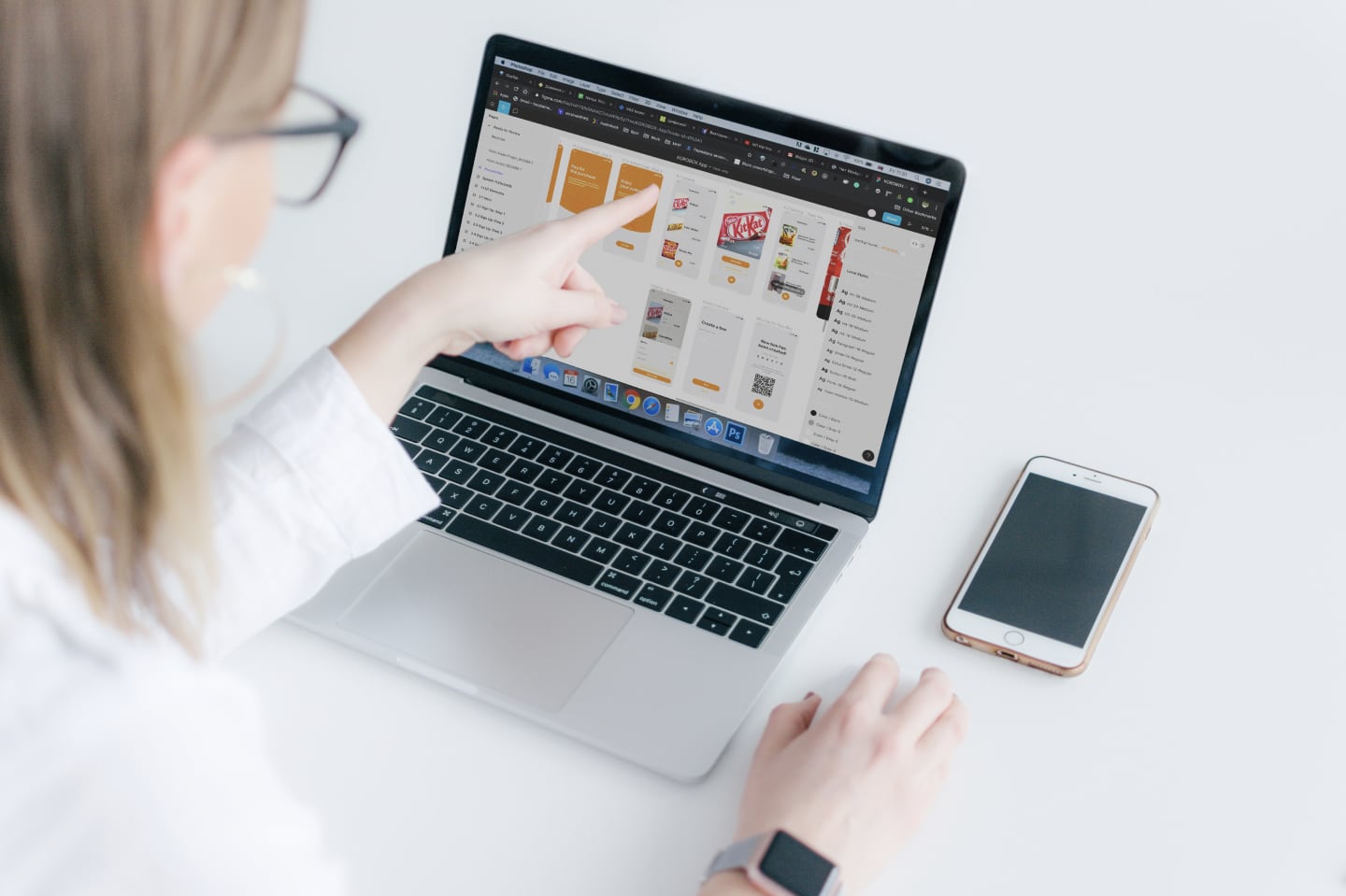 Person browsing an online shopping site displaying product images including snacks