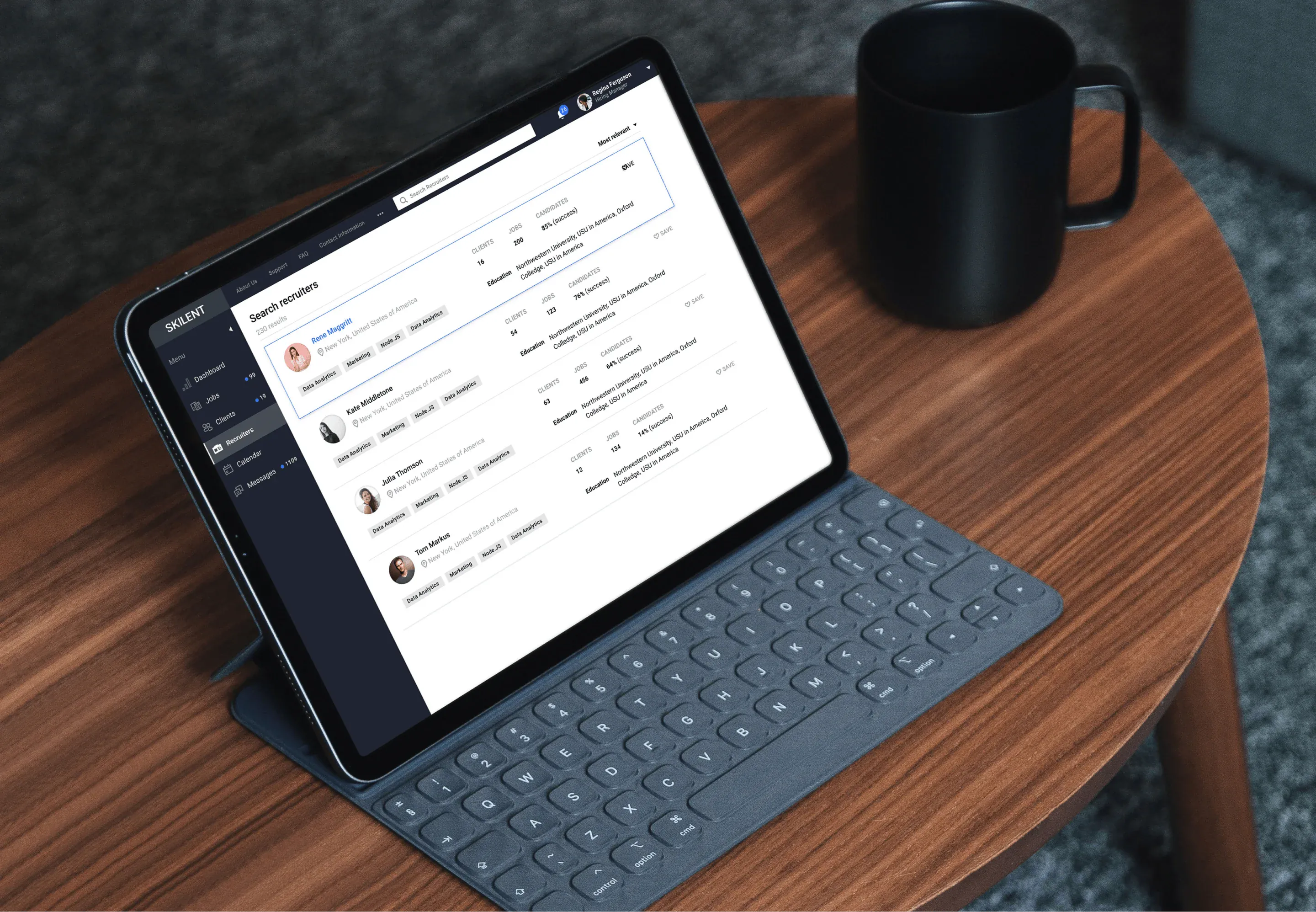 Tablet on wooden table displaying Skilent recruiter search results