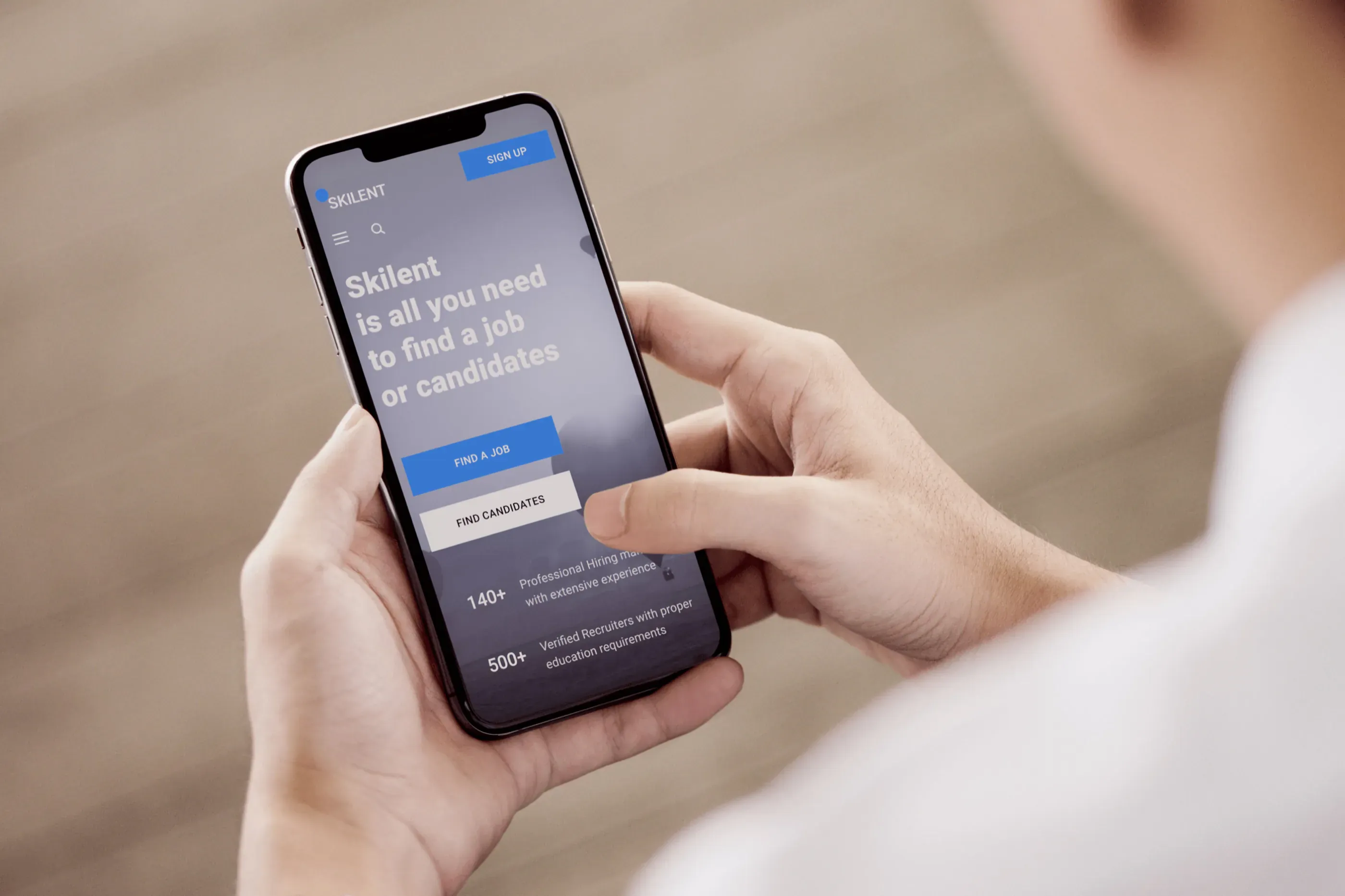 A man reading the homepage of a job search site